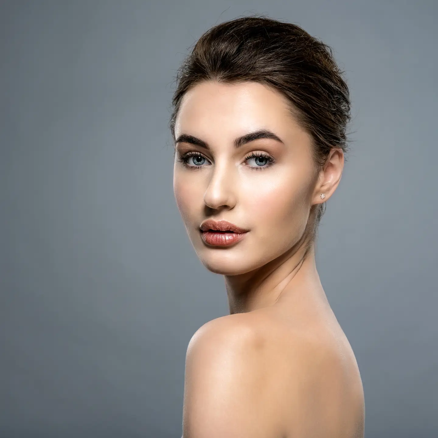 Beautiful face of a caucasian woman with clean fresh skin