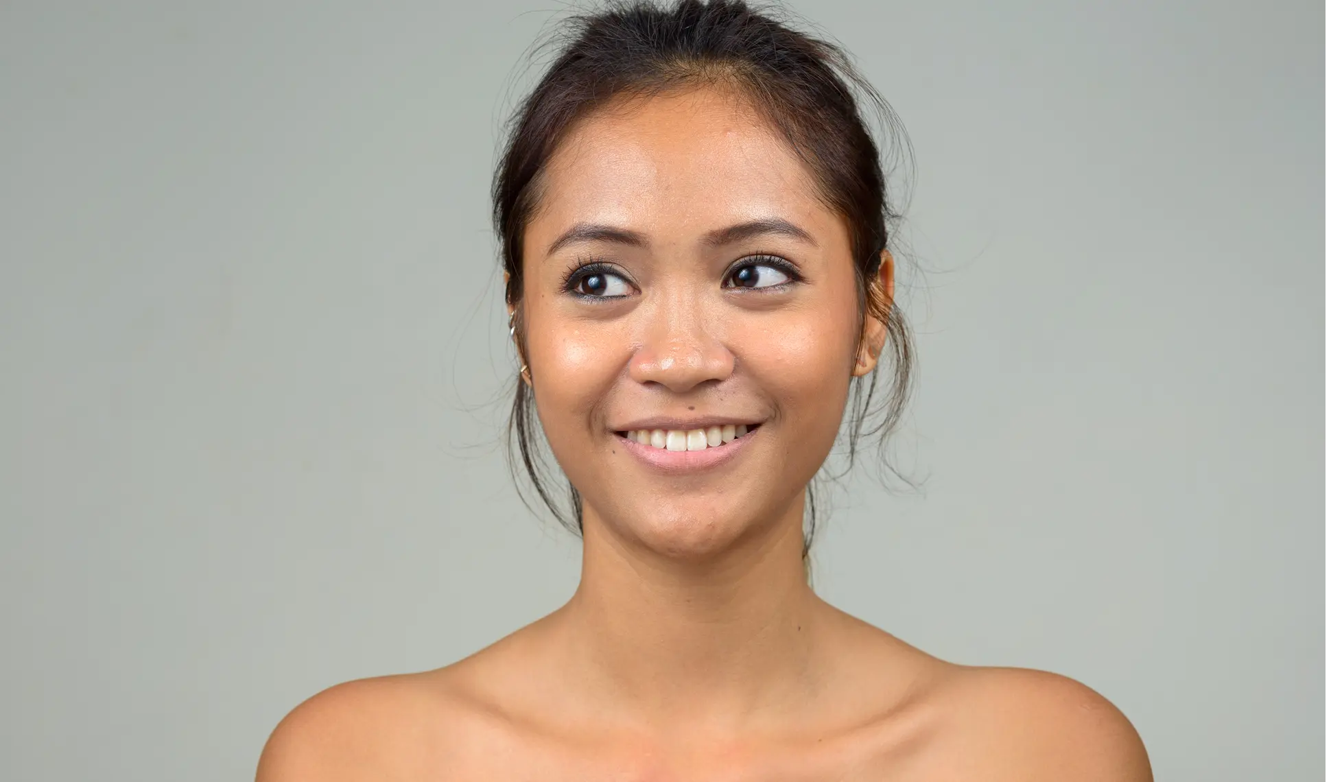 Portrait of young beautiful Asian woman