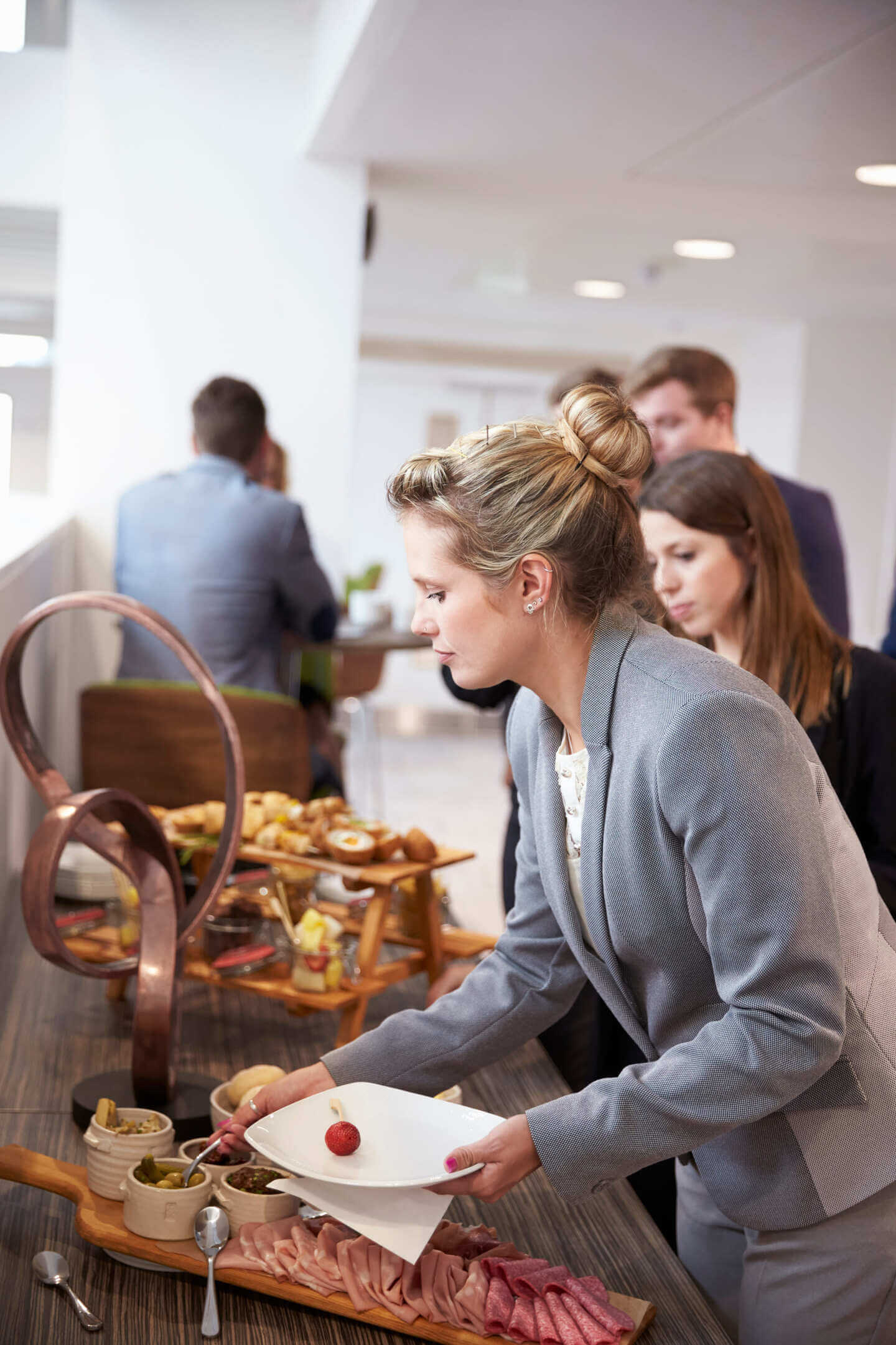 Delegates At Lunch Buffet During Conference Break