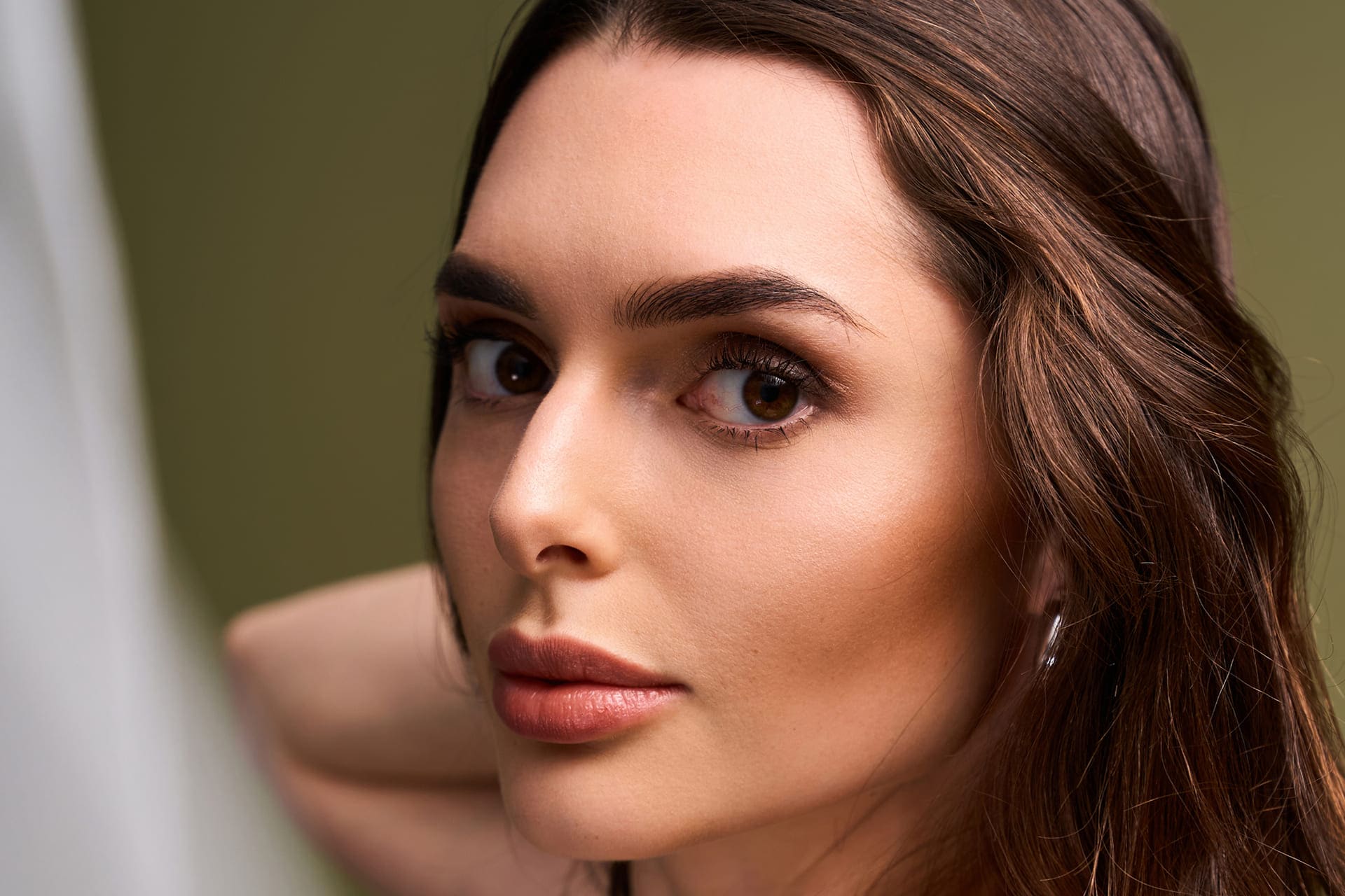 Beautiful young bride radiating joy and elegance in a serene moment of her special day