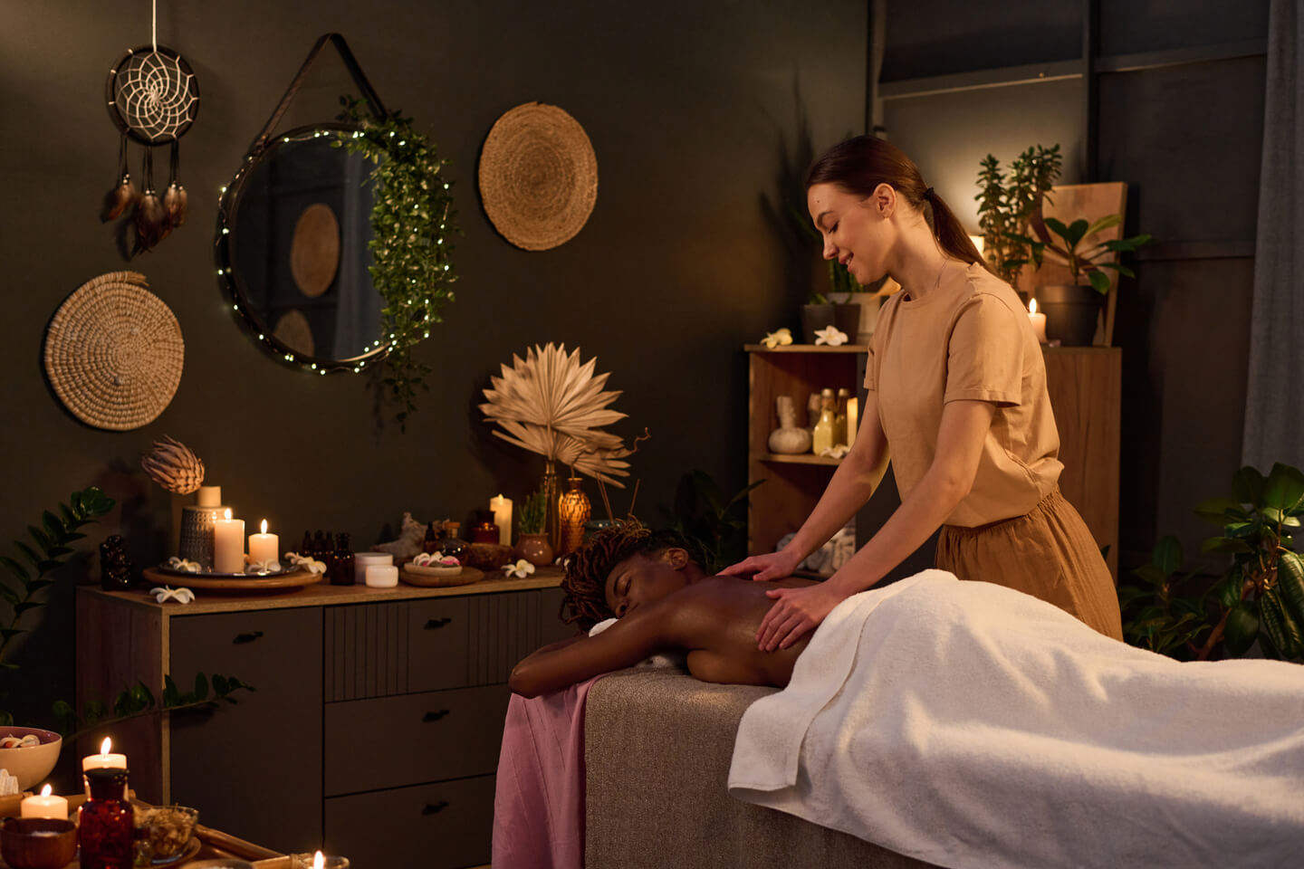 African American Woman Getting Massage in Spa Salon