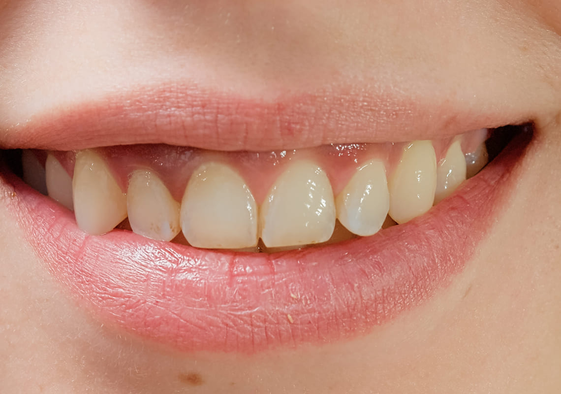 macro-shot-portrait-of-cheerful-woman-smiling